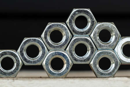 Many hex nuts are used in many industrial applications.の写真素材