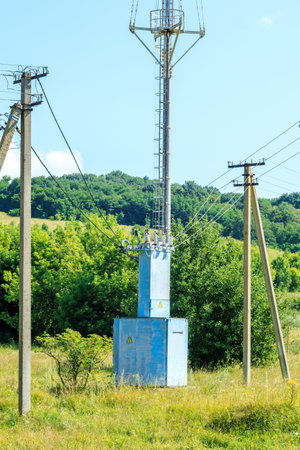 old high voltage transformer and power line.の写真素材