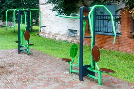 Close-up of an outdoor gym on a sports field in a park. Exercise stations in the public park. Free outdoor gym.の写真素材