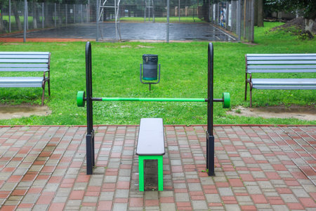 Close-up of an outdoor gym on a sports field in a park. Exercise stations in the public park. Free outdoor gym.の写真素材