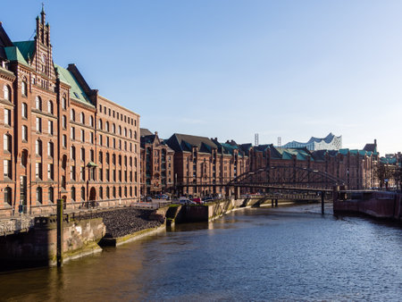 Hamburg, Germany - April 21, 2016:  View from bridge at old warehouse district and Elbphilharmonic Hall in Hamburg at fine weather.のeditorial素材
