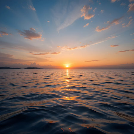 Beautiful sunset on the sea. The sun is reflected in the water.の素材