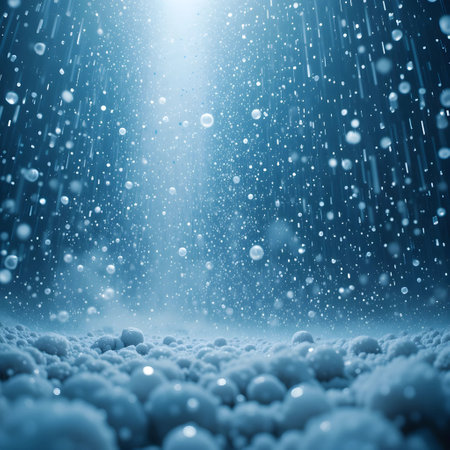 Abstract winter background with falling snowflakes and bokeh lightsの素材