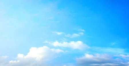 Blue sky and white clouds backgroundの写真素材