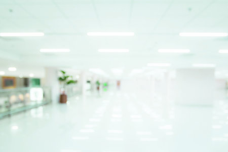 Blurred clean white floor office of hospital interior backgroundの写真素材