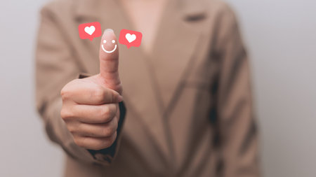 Businesswomenman and show happy smiley face on thumb up with red heart emotion and crown, Good satisfaction feedback rating to service experience. Positive Review.Client Satisfaction Surveys,review.の写真素材