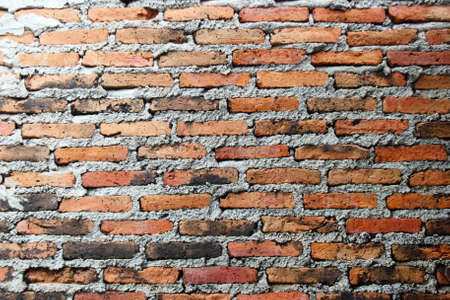 Background of Red brick wall textureの写真素材