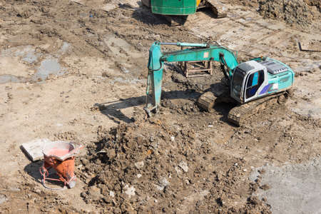 Truck backhoe Soil excavation and soil movement in constructionのeditorial素材