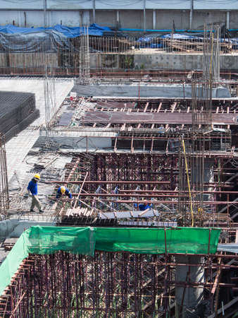 bird-view Construction site with truck metal and workers 