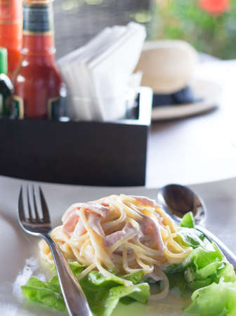 Carbonara  Spaghetti with tomato sauceの写真素材