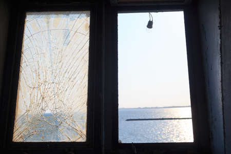 window mirror glass of ship broken and crackedの写真素材