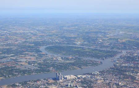 aerial top view from aircraft plane see river and city rural