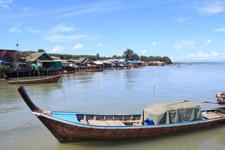Close up head of long tail boat with goods in sea Trang, Thailandの写真素材