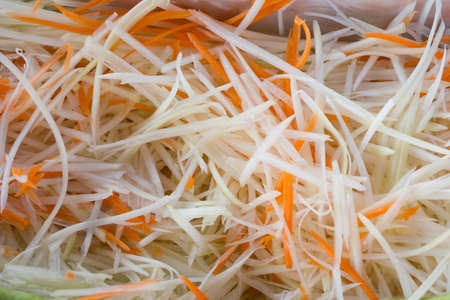 chopped green raw papaya for salad ingredients