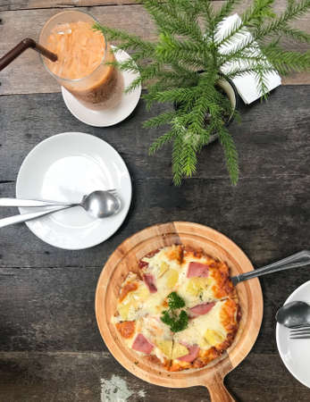 home made pizza on wooden table,delicious and yummyの写真素材