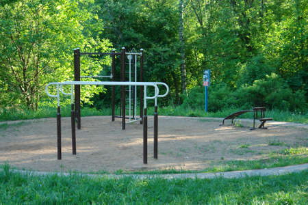 A round sports ground for practicing exercises in the park in the summer.の写真素材