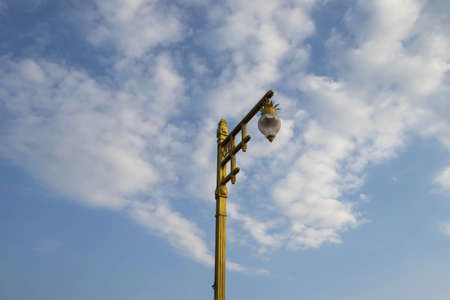 A typical  lamppost on a blue sky background.の写真素材