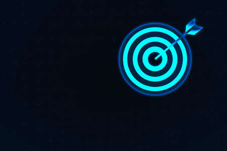 Darts arrows in the target center on blue backgroundの写真素材
