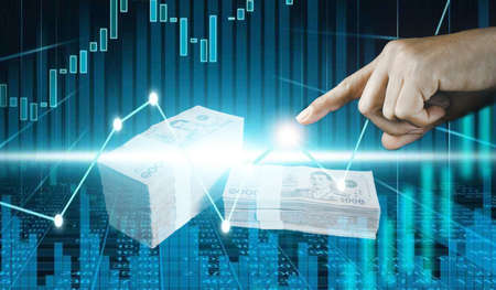 Investment concept,hand with stock financial chart symbols coming from hand