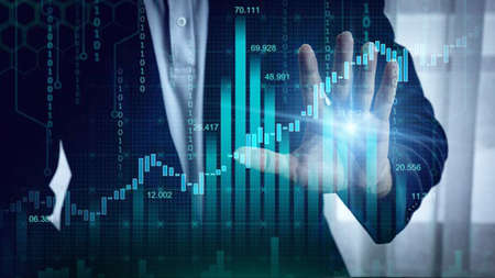 Stock market investment concept with businessman hand touching digital screen with forex chart...