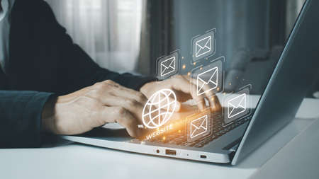 email marketing concept, company sending many e-mails or digital newsletter to customersの写真素材