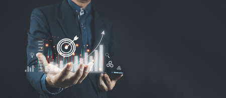 Stock Market Investments Funds and Digital Assets. businessman analyzing forex trading graph financial data from tablet. business finance technology and investment concept, technology Business financeの写真素材
