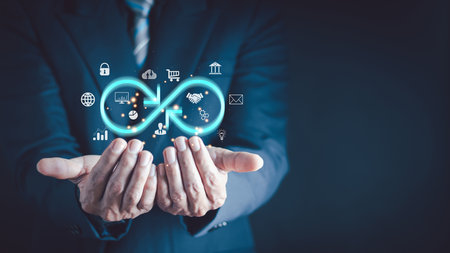 Technology data link concept, Businessman Hands holding virtual infinity with technology marketing online icon for symbol of connection to community metaverse world network system concept.の写真素材