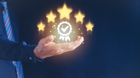 Businessman Hand shows the sign of the top service the best Quality assurance, Guarantee, Standards,...