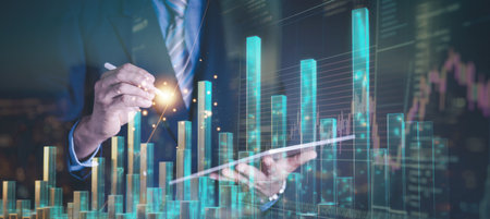 Business analysis, trading concept, Businessman, finance analyst using digital tablet, analyzing financial graph, stock market report, economic graph growth chart, business and technology backgroundの写真素材