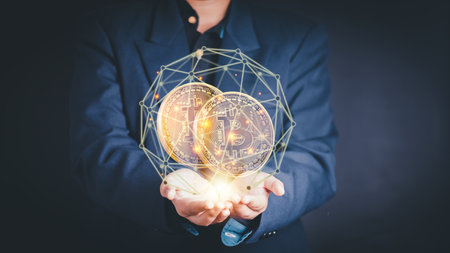 Global currency exchange and forex concept, Business man hand holding world with virtual line effect and dollar yuan yen euro and pound sterling sign with copy space.の写真素材