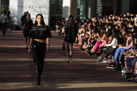A female model walks on the ramp during Bangkok International Fashion Week 2013,Thailand - Nov...
