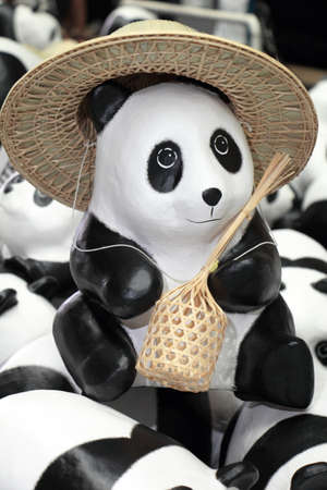 Bangkok, Thailand March 13, 2016: A flash mob of 1,600 Paper Mache pandas a campaign showcase by  WWF and French artist Paulo Grangeon to promote environmental preservation at Hualumpong TrainStationのeditorial素材