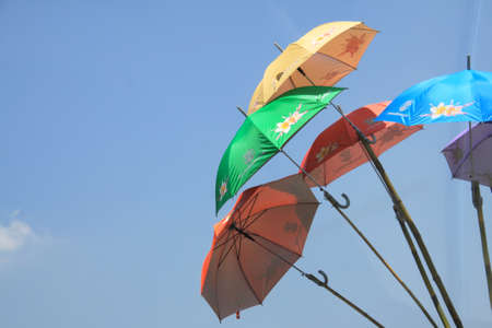 Lots of colorful umbrellas street decoration at the Songkran Festival in Phra Pradaeng , Samut Prakarn Thailandのeditorial素材