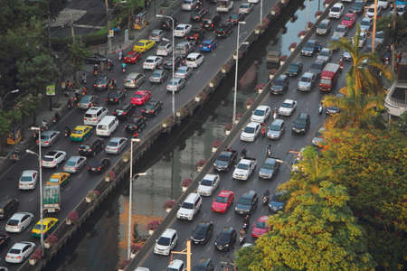 Bangkok, Thailand - April 6, 2016 : Sathon Road ,City of Bangkok aerial perspective of heavy traffic one direction and light traffic the other with  pedestrian and busy traffic , rush hour afterworkのeditorial素材