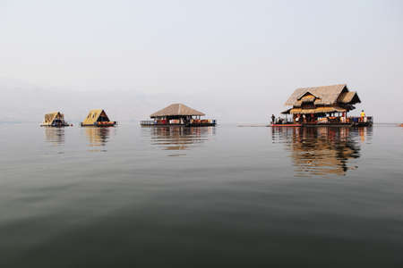 Array of Floating Lake Houses on The Srinagarind Dam  in Si Sawat District of Kanchanaburi Province, Thailand.の写真素材