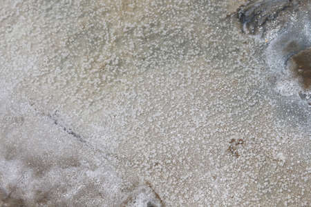 Sea Salt crystals laying in a messy pile ,Salt Evaporation Pond prepare for harvesting,Samut Sakhon Province, Thailandの写真素材