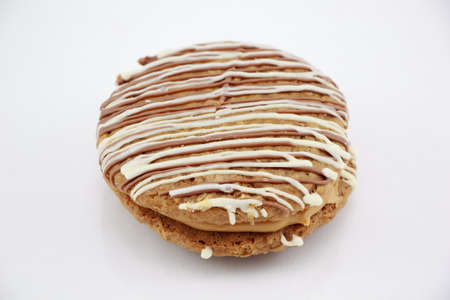 Top view of Peanut butter brown chocolate cookies sandwich isolated on white backgroundの写真素材