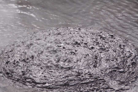 Bubbles from cauldron-like mud pools at Rotorua, New Zealand where is one of the world's most spectacular Geothermal Wonderlands.の写真素材