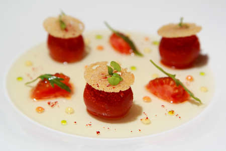 A work of art " Candied tomato gazpacho " gourmet plateの写真素材