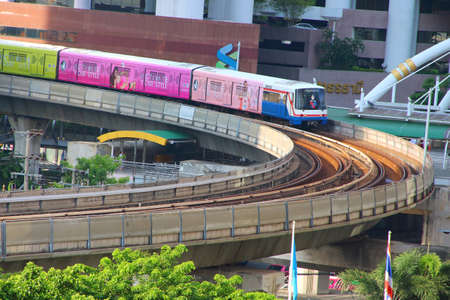 Bangkok, Thailand : October 27, 2016 : The Bangkok Mass Transit System BTS or Skytrain Goes Round Cornering through the city center Chongnonsi Station, Silom line (out bound)のeditorial素材