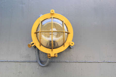 Close up of The Deck Outdoor Lighting Fixture System of Old Military Battleshipの写真素材