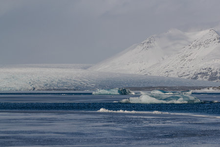 Snow-covered mountains and frozen sea
