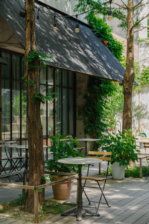 Ivy-Covered Wall with Glass Door and Windowsの写真素材