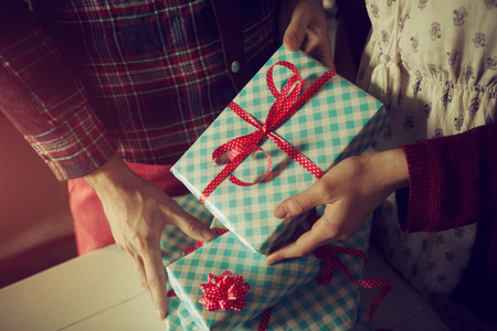 Couple exchanging gifts