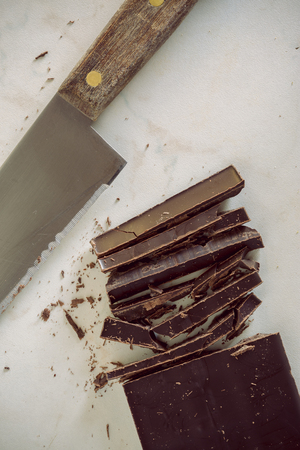 Cutting the chocolateの写真素材