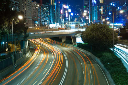 traffic at night in blur motion downtown - Causeway Bay, Hong Kongの写真素材