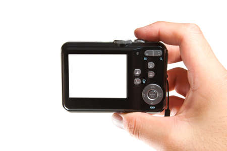 hand holding a digital camera isolated on white with empty lcd monitor