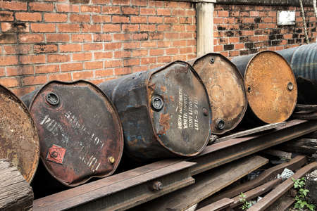 Old rusted metal  oil storage tankの写真素材