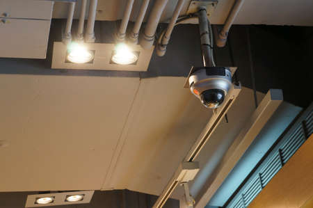 security camera of corridor ceiling with light