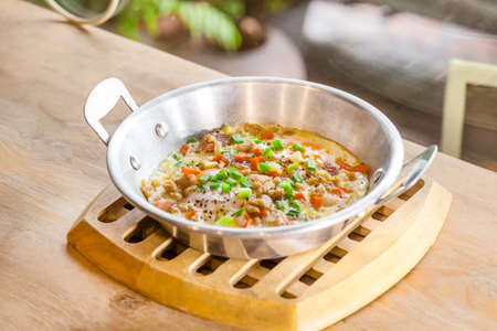 fried eggs pan with minced pork onion  carrotの写真素材